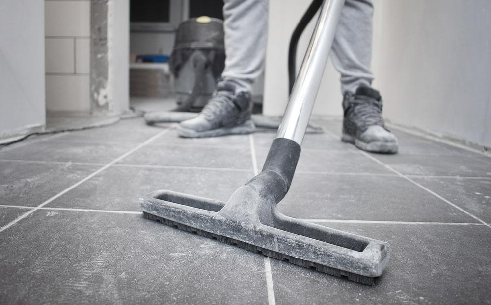 pa person vacuuming up dusty particles from a recent renovation